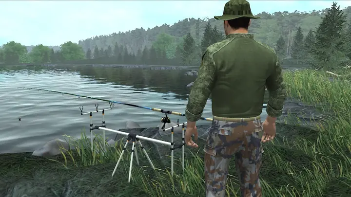 Professional Fishing 2: pescador de chapéu de abas junto a um suporte de canas montado na margem de um lago